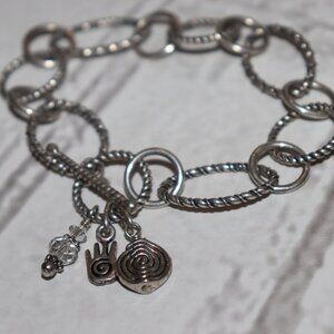 Beautiful silver charm link bracelet with toggle clasp 8"